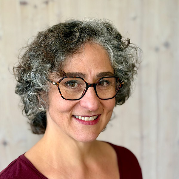 Portrait de Deborah, thérapeute en réflexothérapie à Meyrin, spécialisée dans l’accompagnement du stress et de la surcharge
